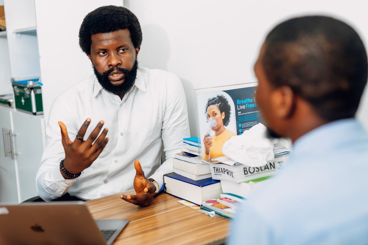 A doctor talking with a patient in a medical office